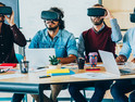  Group of people testing Virtual Reality Simulator.