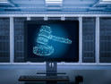 outline of gavel on computer screen with hard drives in the background