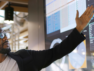 IT leader engages with AI in the workspace