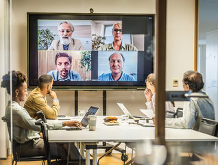 Coworkers in a conference room space