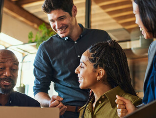 Coworkers collaborating in the office