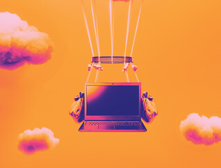 Abstract image of networking with a laptop in the clouds