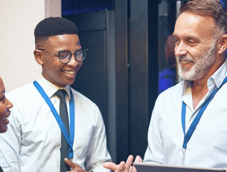 IT leader working with tech support