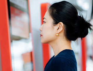 Person using touchscreen kiosk