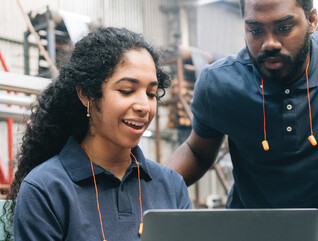 Workers in a manufacturing facility
