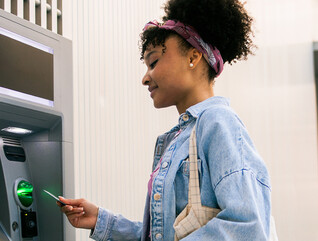 Person using an ATM