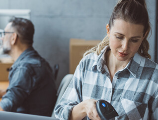 Small business owners processing orders