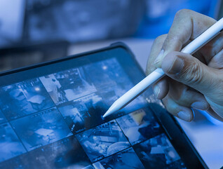 Security guard using tablet