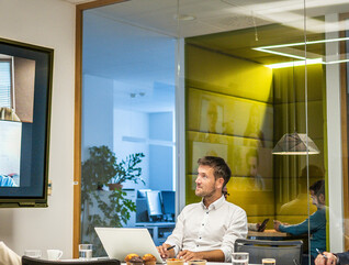 People in a hybrid workspace