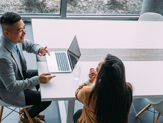 Co-workers collaborating