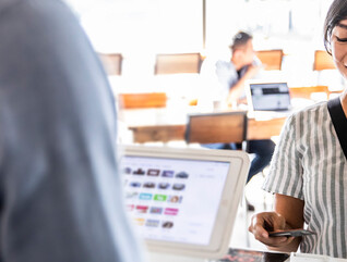 Person buying coffee