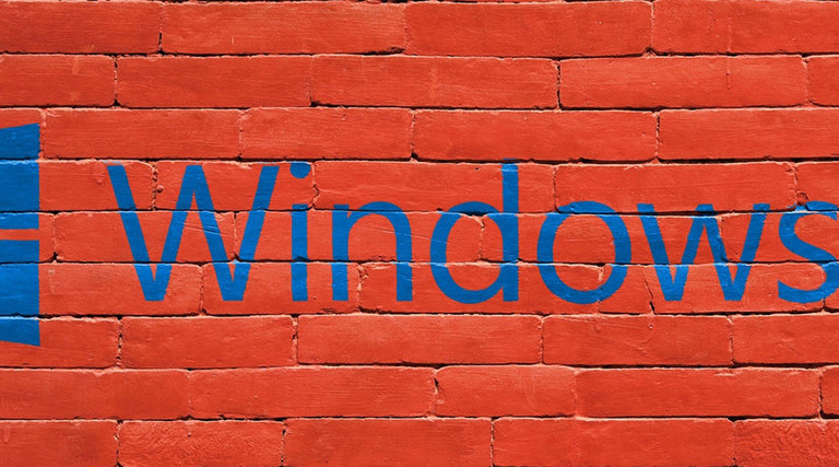Windows 10 logo on brick wall