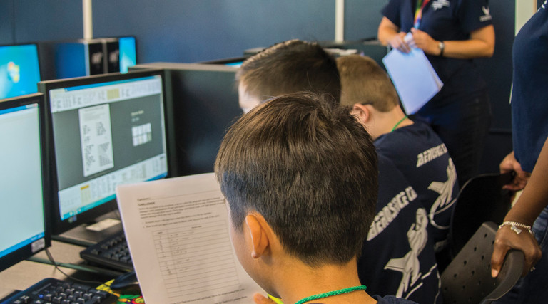 STARBASE instructor Susie Tyson gives directions on how to apply STEM concepts using Morse Code for a potential real-world situation during a two-day STARBASE camp for seventh and graders on Wright-Patterson Air Force base, Ohio, July 11, 2018