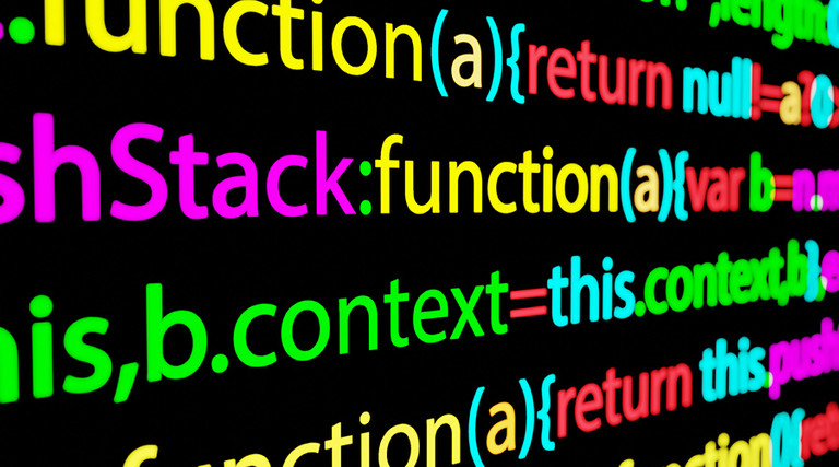 Colorful screen of programming editor in dark mode.