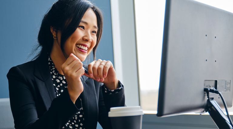 Female employee sitting at a workspace 