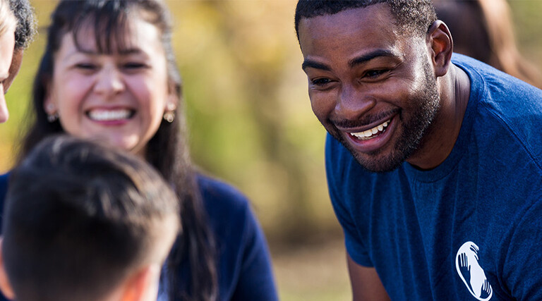 Multi-racial group of nonprofit volunteers