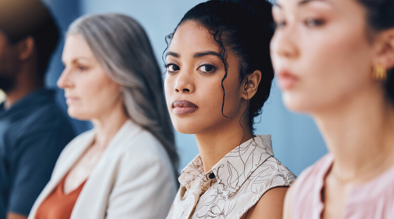 Person looking into camera during meeting