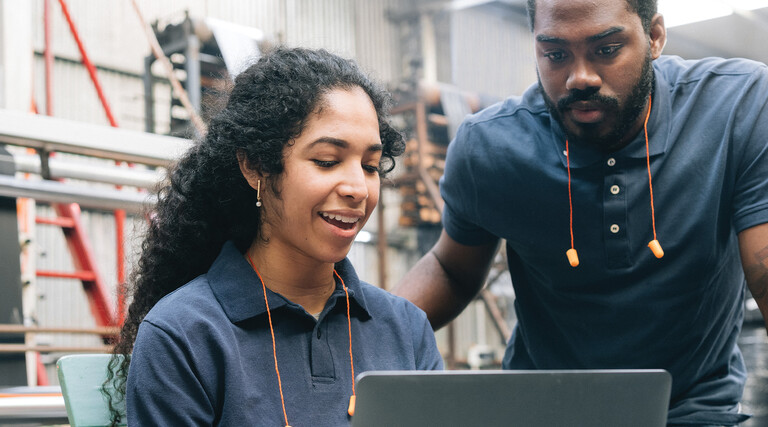 Workers in a manufacturing facility