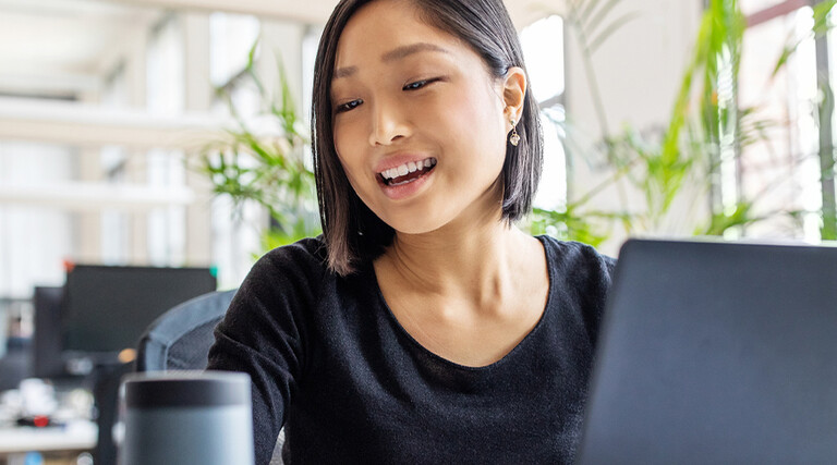 Person using an AI assistant in the office