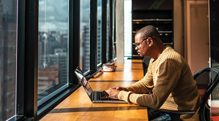 Man in Office at laptop