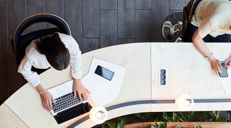 People working with Wi-Fi connected devices