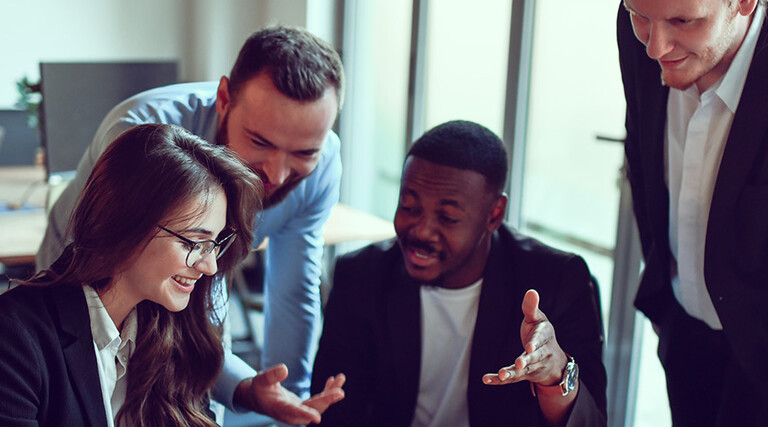 IT leaders in a modern workspace