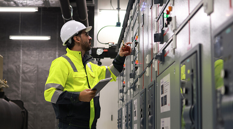 Engineers working in the main control room