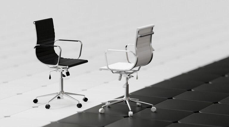 Two office chairs black and white