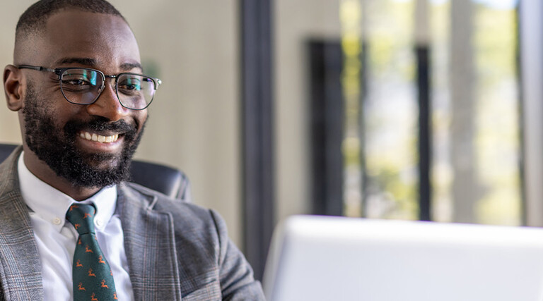 Person using computer in office