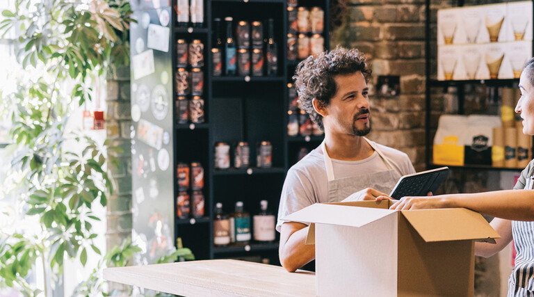 Small business owners working together in a shop