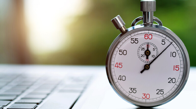 Stopwatch on laptop keyboard