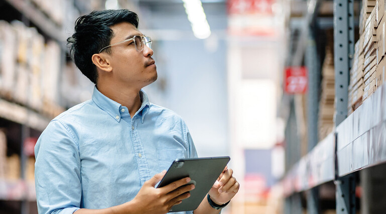 Business leader checking inventory 