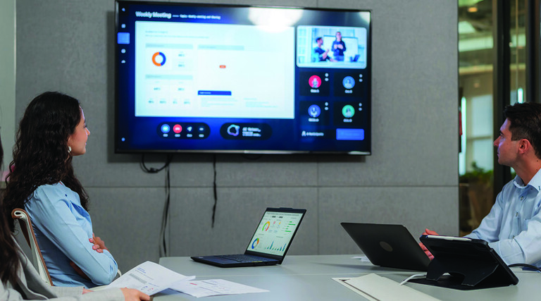 People reviewing screen