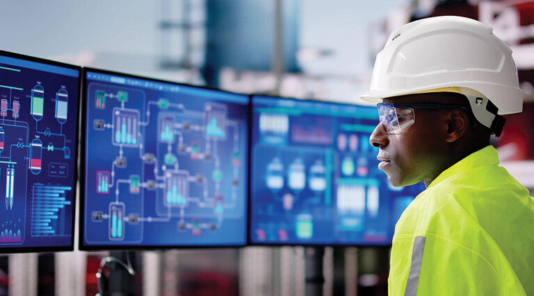 E&U worker looks at data