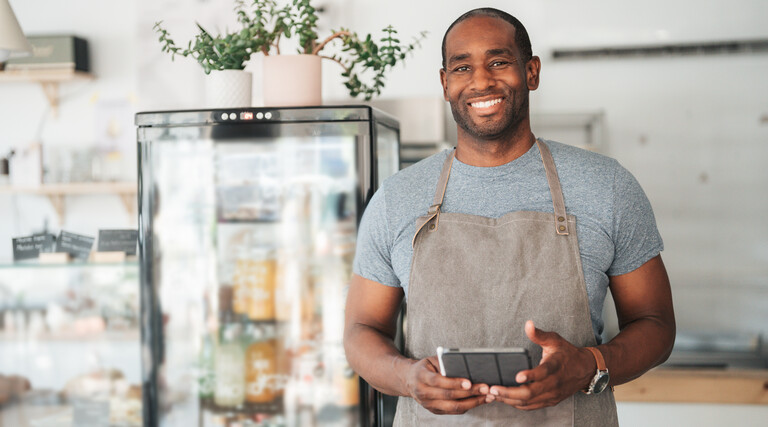 Small business owner with tablet