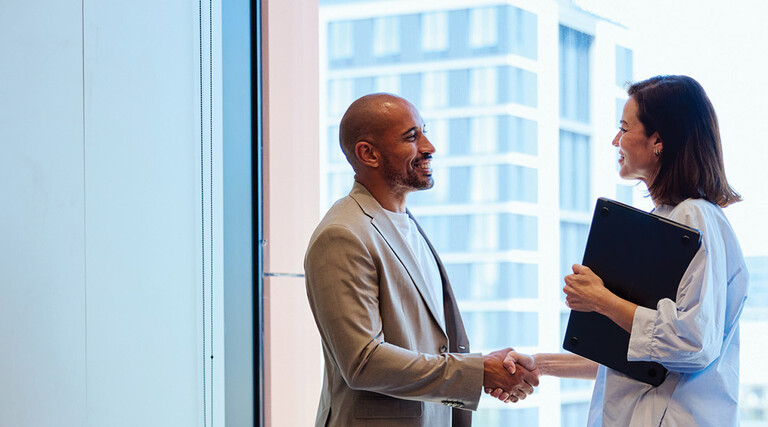 A business meeting ends with a handshake
