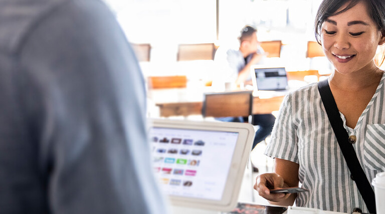 Person buying coffee
