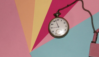 Clock and padlock chained together