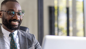 Person using computer in office