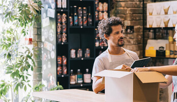 Small business owners working together in a shop
