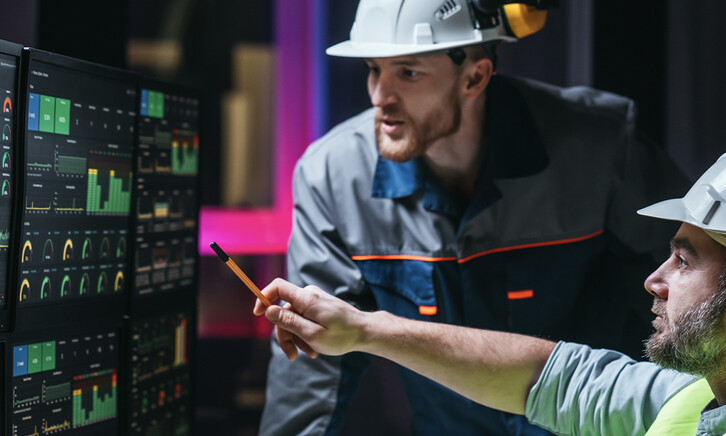 Engineers reviewing data