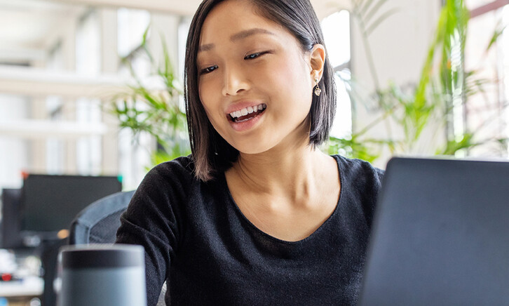 Person using an AI assistant in the office