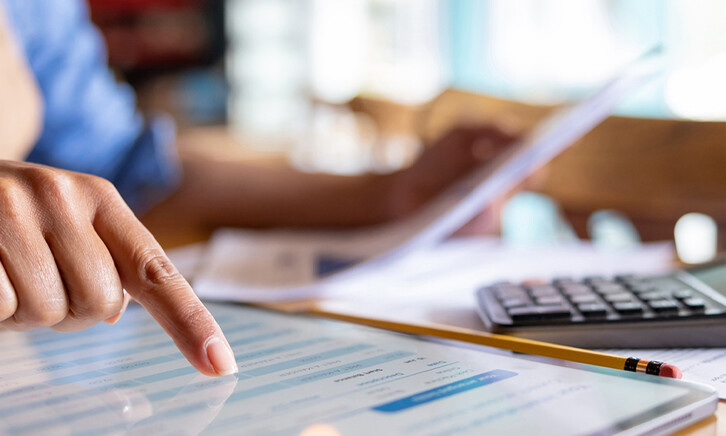 Person calculating business expenses