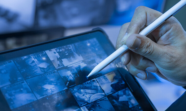 Security guard using tablet