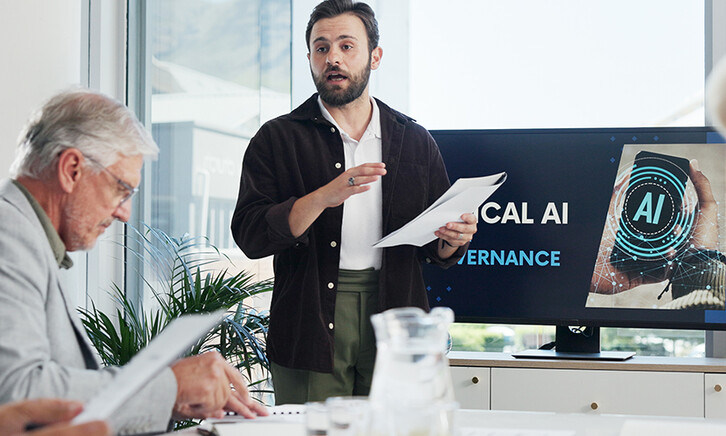 Group of people having AI governance discussion