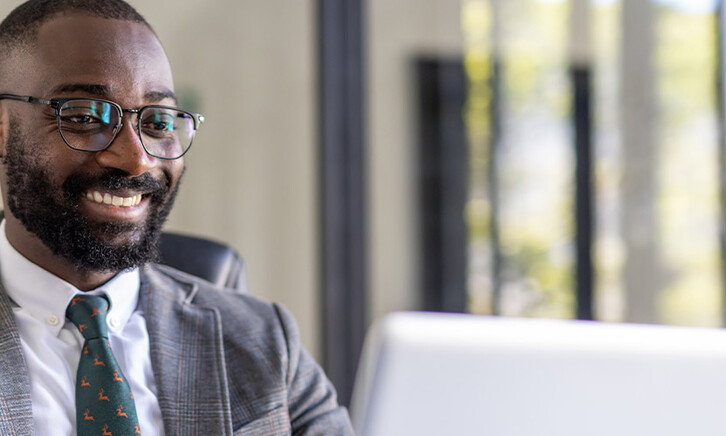Person using computer in office