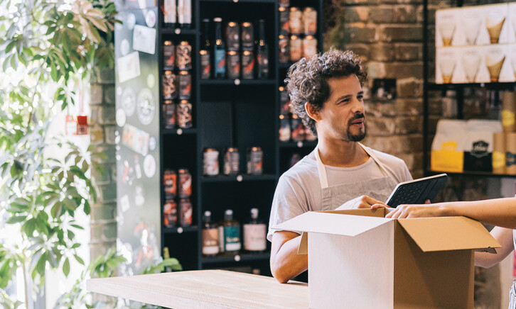 Small business owners working together in a shop