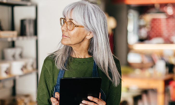 small business owner on tablet