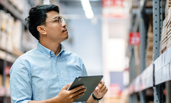 Business leader checking inventory 