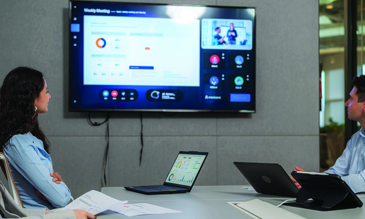 People reviewing screen